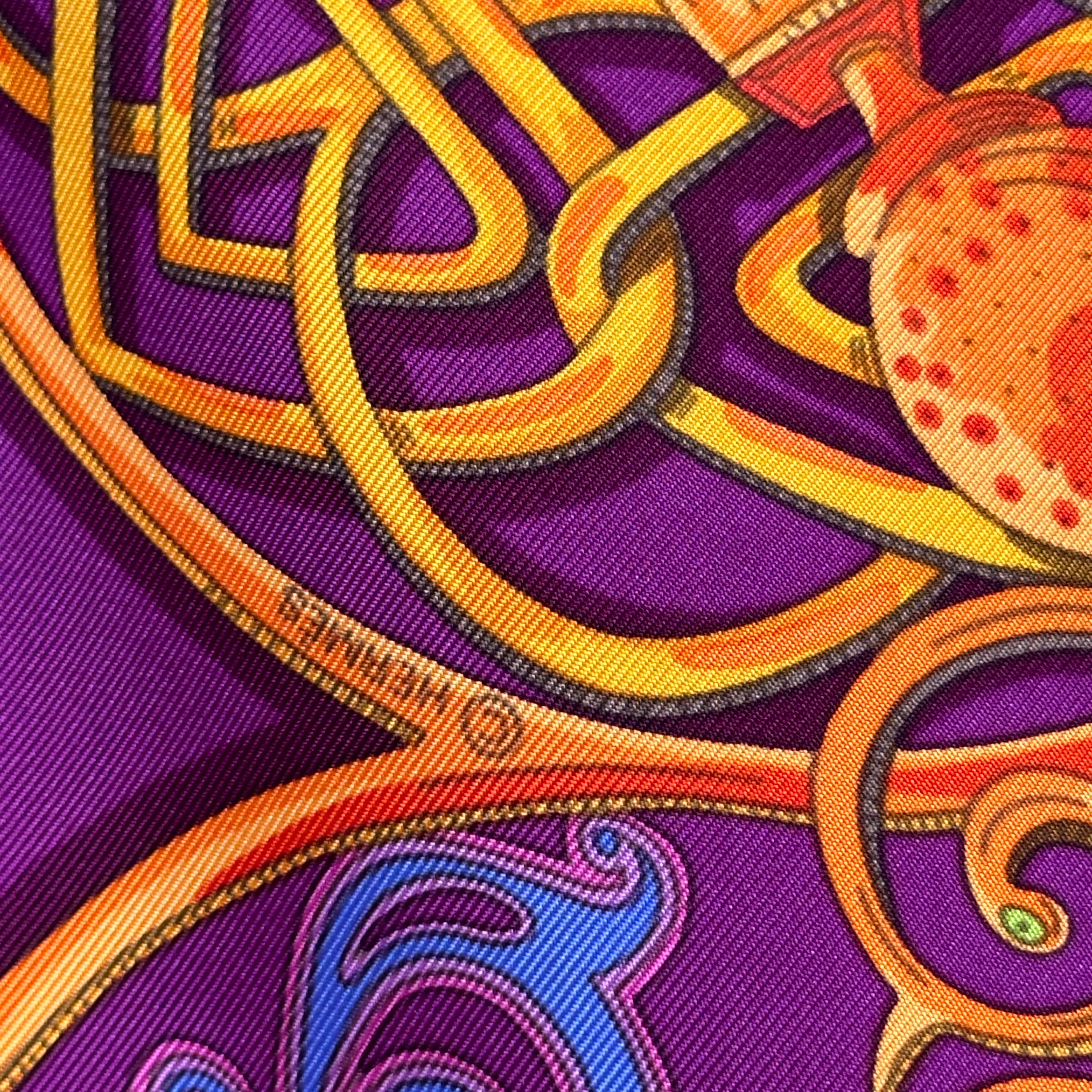 foulard carré hermès la charmante aux animaux logo du copyright hermès